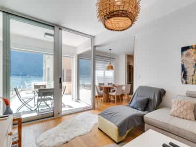 Attractive 86 m² Apartment in Dobrota – Large Terrace, Sea View, Garage and Storage Room