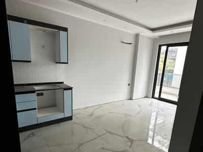 Квартира 1+1 от инвестора в центре Алании, пляж Клеопатра (13400)