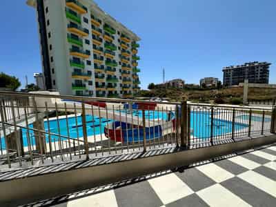 New Investment Apartment 2+1 in a Residential Complex in Alsancak Area (19500)