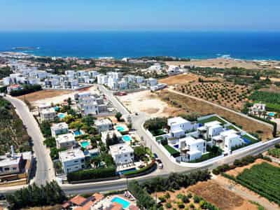 Villas with swimming pools in a residence with a green area, Paphos, Cyprus