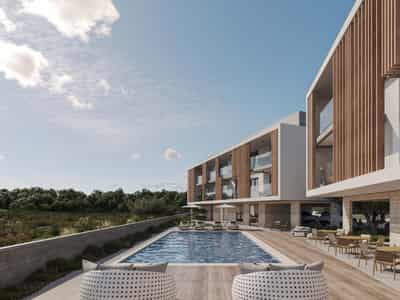 New low-rise residence with a swimming pool and gardens close to the beach and the center of Paphos, Cyprus