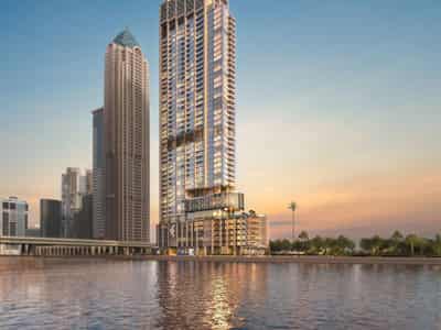 New high-rise residence One River Point with swimming pools on the canal front, close to Burj Khalifa, Business Bay, Dubai, UAE
