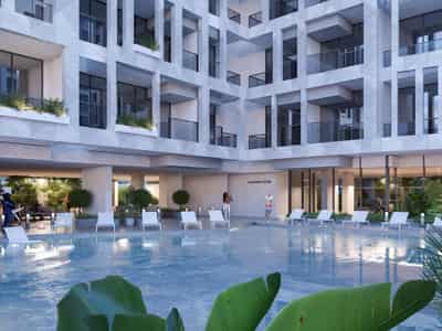 New complex of serviced apartments Sky Suites with swimming pools, a spa and a restaurant, JVC, Dubai, UAE