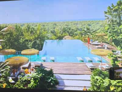 New high-rise project Talea with a swimming pool, a spa and a co-working space, Forest District, Dubai, UAE