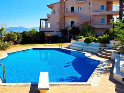 Residence with a swimming pool, a garden and a panoramic view, 500 meters from the beach, Theologos, Greece