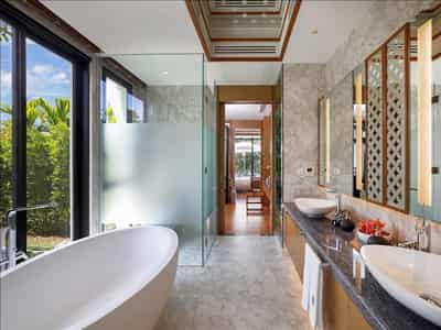 Complex of villas with swimming pools and jacuzzis directly on Bang Tao Beach, Phuket, Thailand