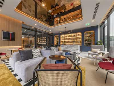 High-rise residence with a swimming pool and lounge areas in a posh neighborhood of Bangkok, Thailand