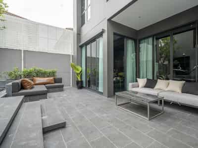 Complex of villas with swimming pools, lounge areas and clubhouses, Bangkok, Thailand
