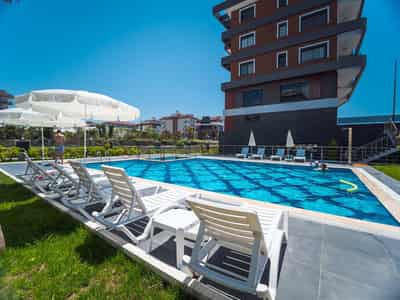 Cozy residence with swimming pools at 150 meters from the beach, Kestel, Turkey