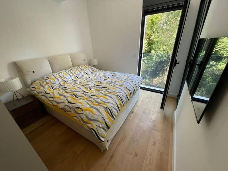 One-Bedroom Apartment in a Residential Complex Under Construction in Bečići with Rooftop Pool — photo 7