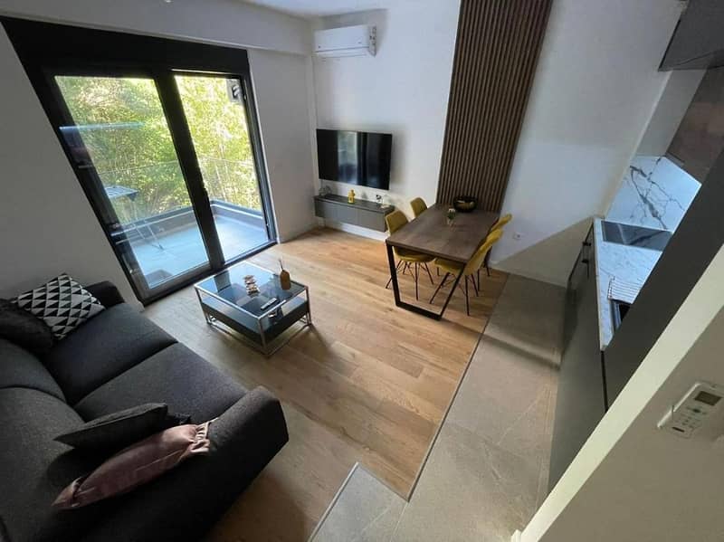 One-Bedroom Apartment in a Residential Complex Under Construction in Bečići with Rooftop Pool — photo 2