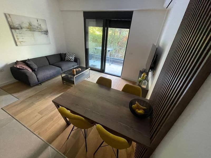 One-Bedroom Apartment in a Residential Complex Under Construction in Bečići with Rooftop Pool — photo 4
