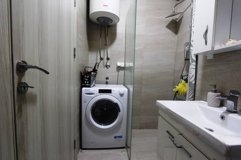 Apartment in Budva with city and sea views — photo 9