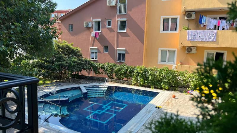 Two-Bedroom Apartment in House with Pool in Budva — photo 8