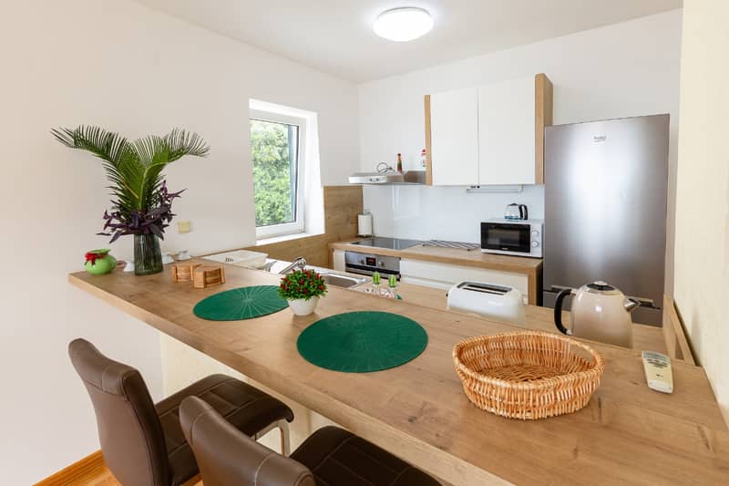 Spacious two-level apartment with sea view in Sveti Stefan — photo 6