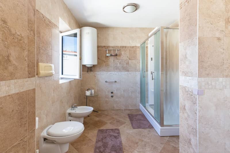 Spacious two-level apartment with sea view in Sveti Stefan — photo 27