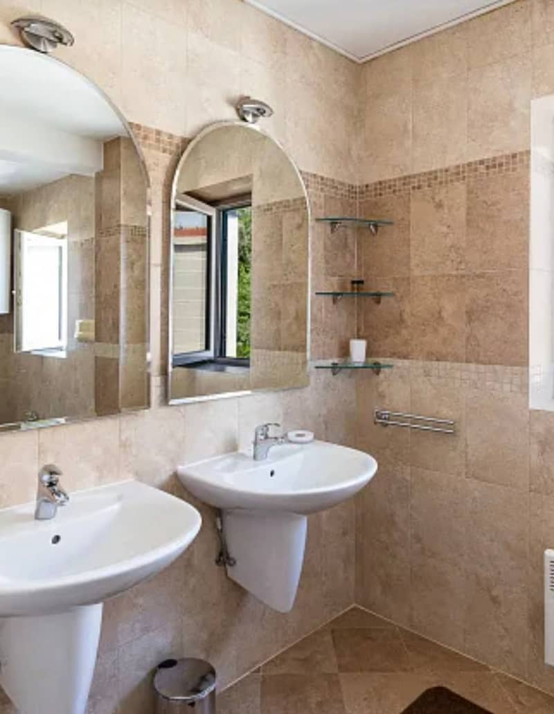 Spacious two-level apartment with sea view in Sveti Stefan — photo 25