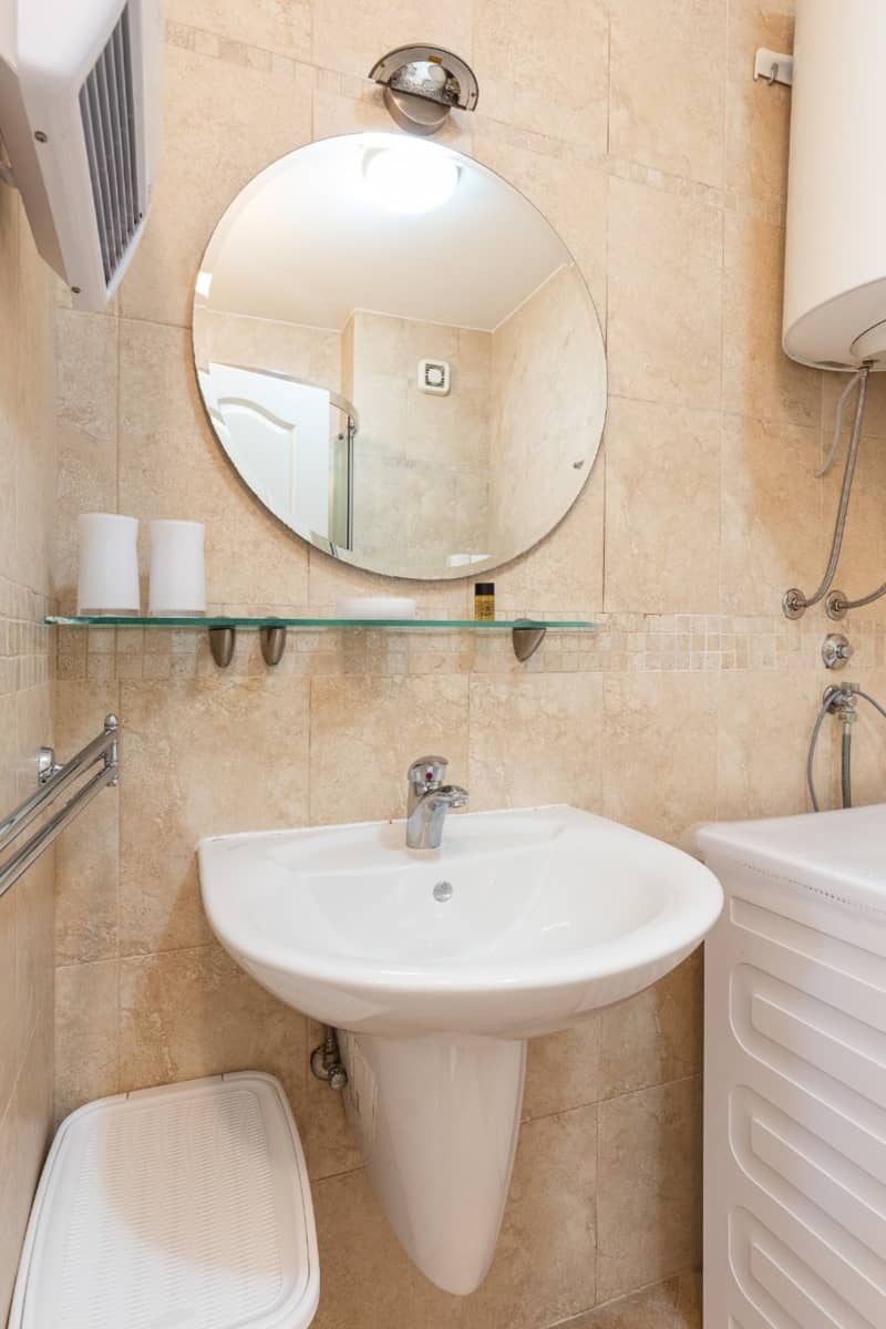 Spacious two-level apartment with sea view in Sveti Stefan — photo 16