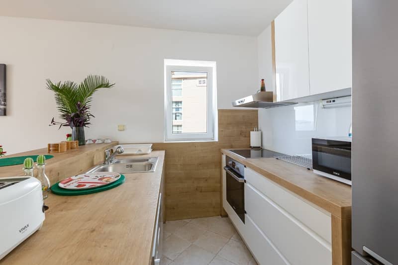 Spacious two-level apartment with sea view in Sveti Stefan — photo 8