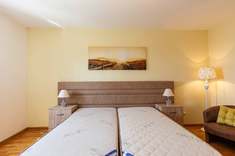 Spacious two-level apartment with sea view in Sveti Stefan — photo 31