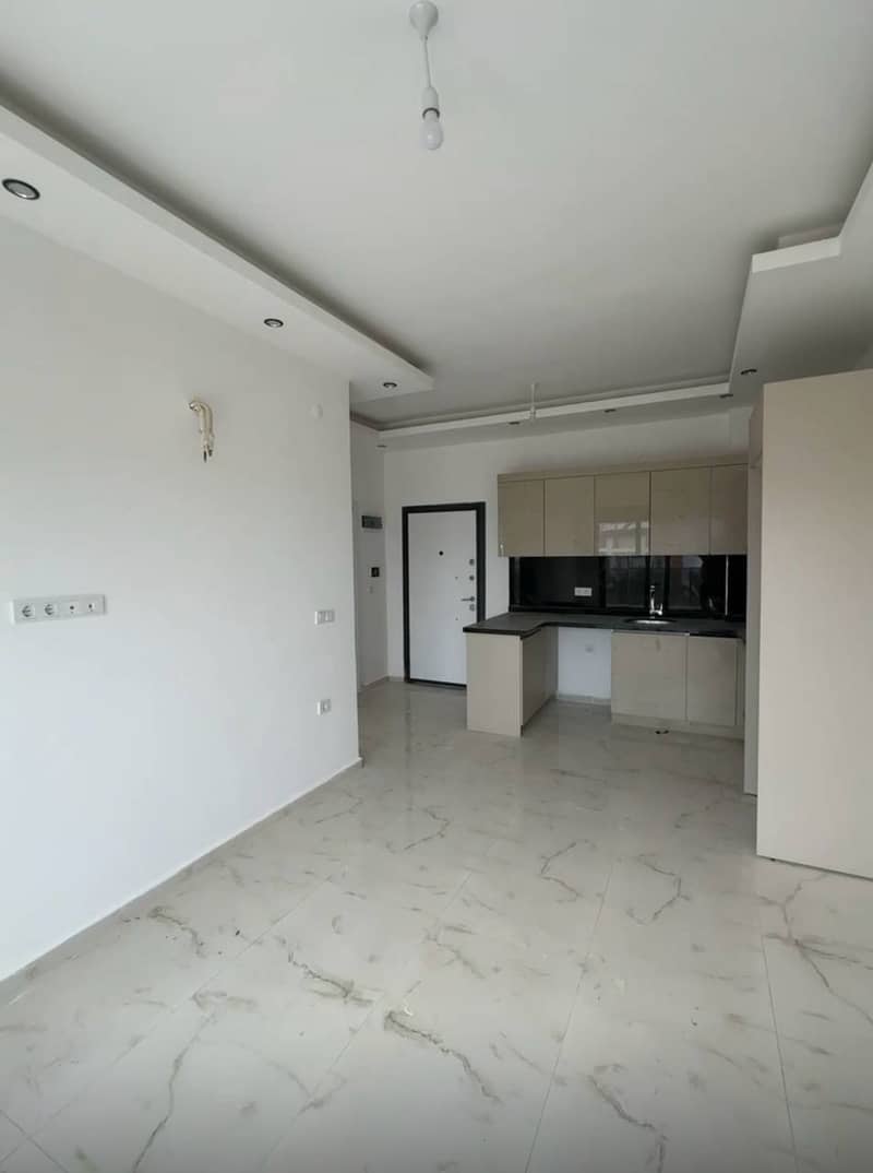 Новая квартира 1+1 в центре Авсаллара (01100) — фото 4