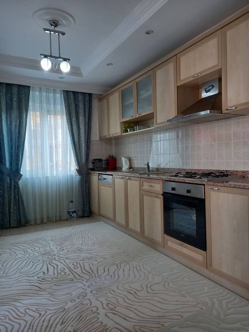 Просторная квартира с 2 балконами в живописном районе Оба (31800) — фото 9
