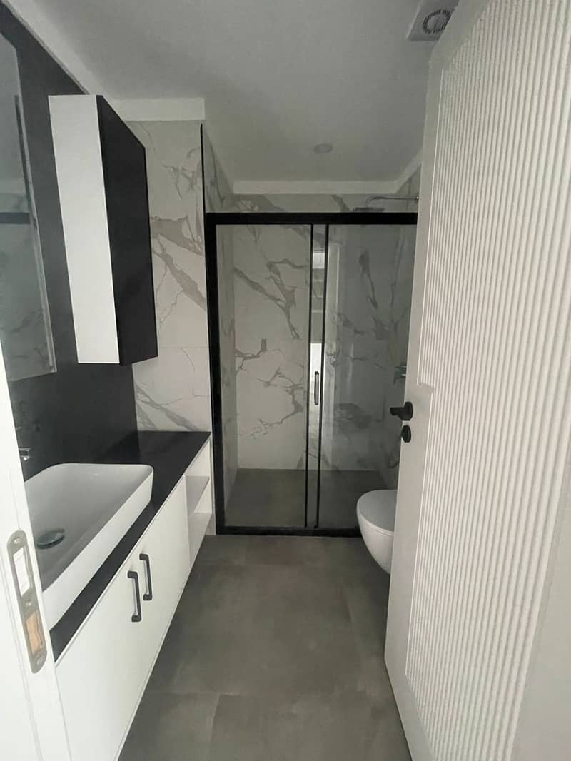 Квартира планировки 1+1 в новом комплексе в самом центре Алании (32600) — фото 10