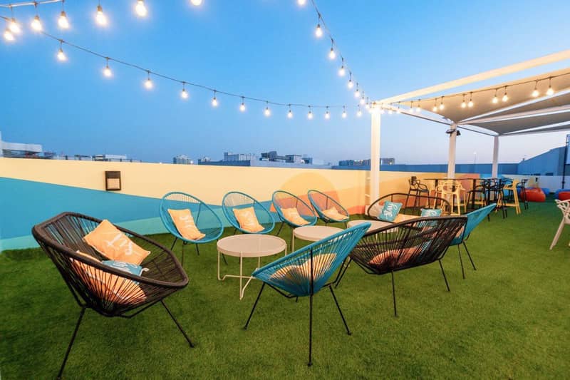 Complex of serviced apartments Izzzi Life with a swimming pool and a co-working area, JVC, Dubai, UAE — photo 7