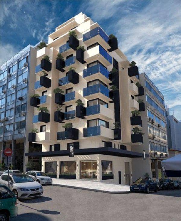 New building with an elevator close to a metro station and the port of Piraeus, Greece — photo 2