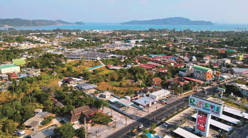 Modern residential complex with a large swimming pool opposite a shopping center in Chalong, Phuket, Thailand — photo 18