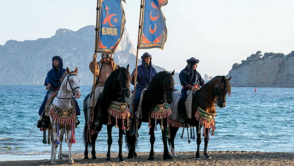 Riders in medieval costumes