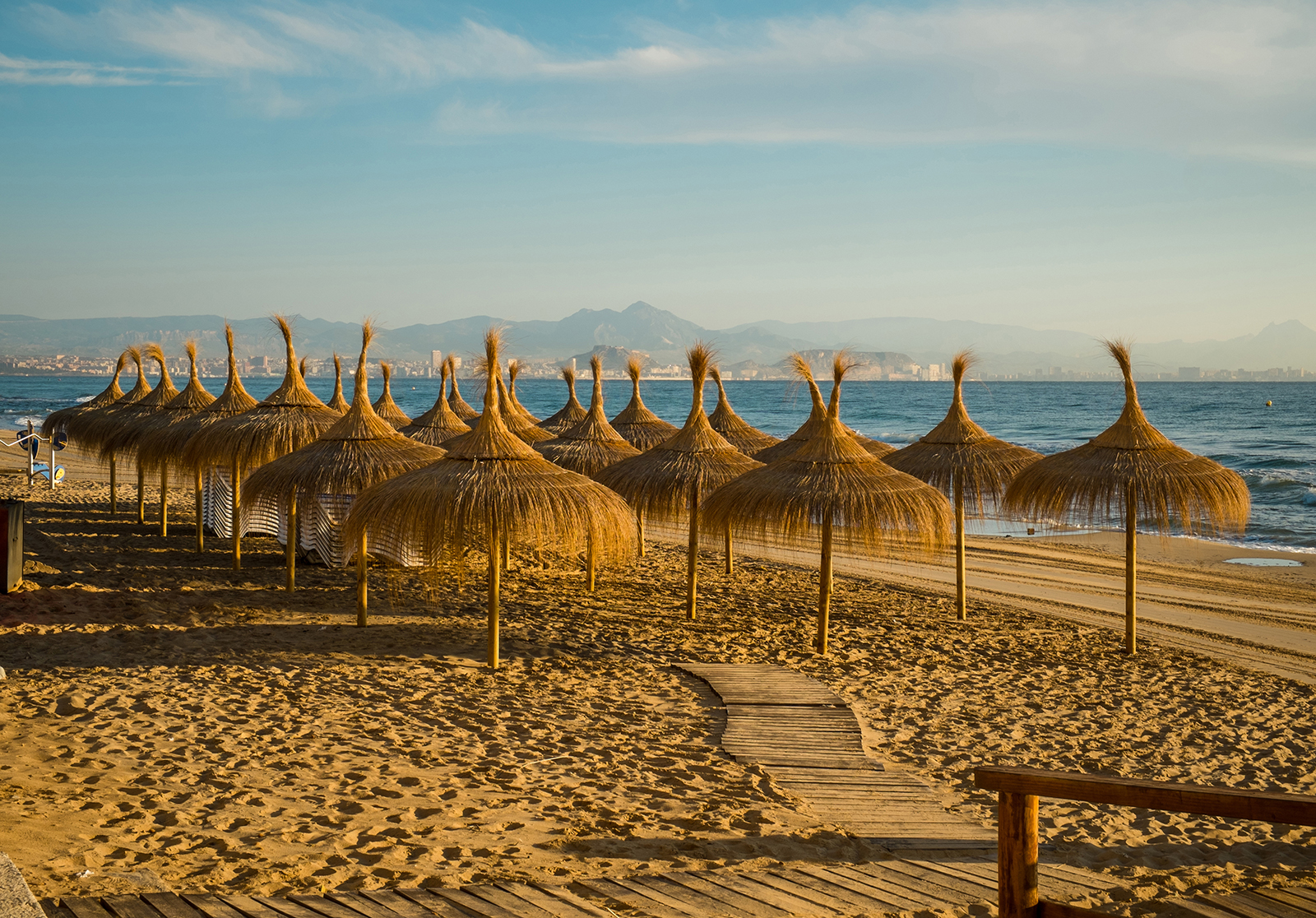 Beach view with straw umbrellas