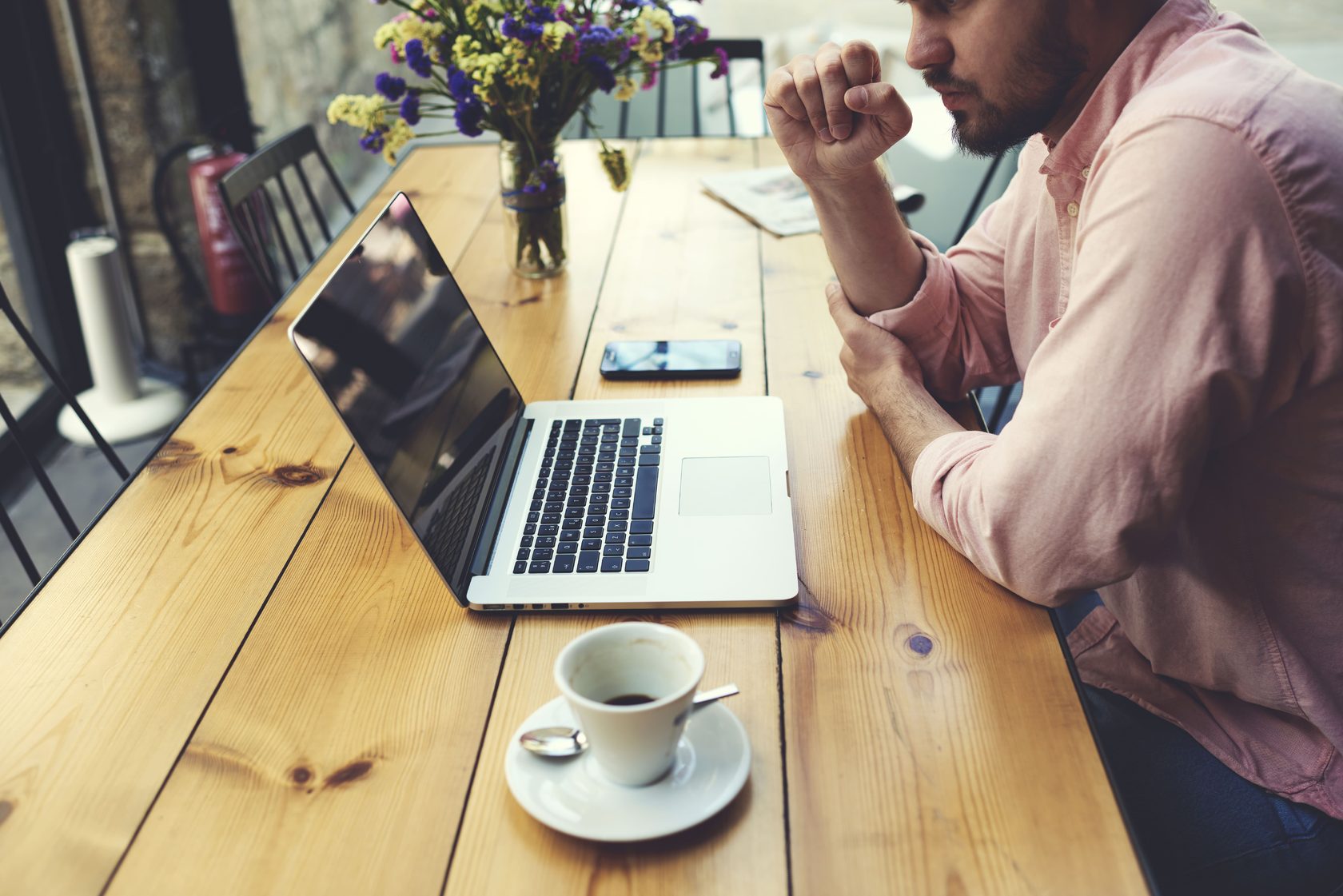 Man sitting in front of laptop