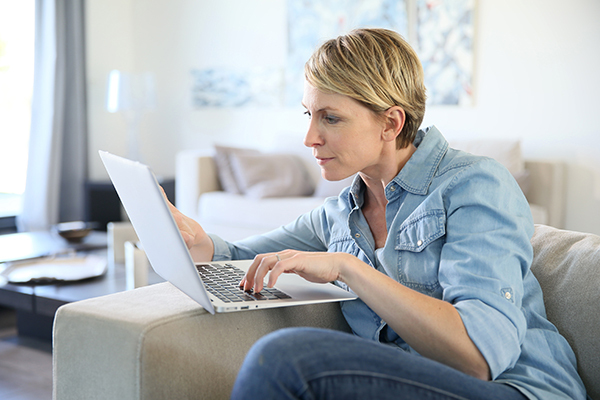 Woman in front of laptop